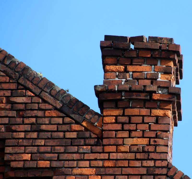 Signs Your Coronado Home Needs a Chimney Inspection Damaged chimney on an Coronado home showing cracks and missing mortar